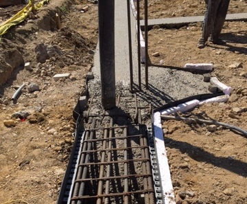 Concrete pour forming the foundation
